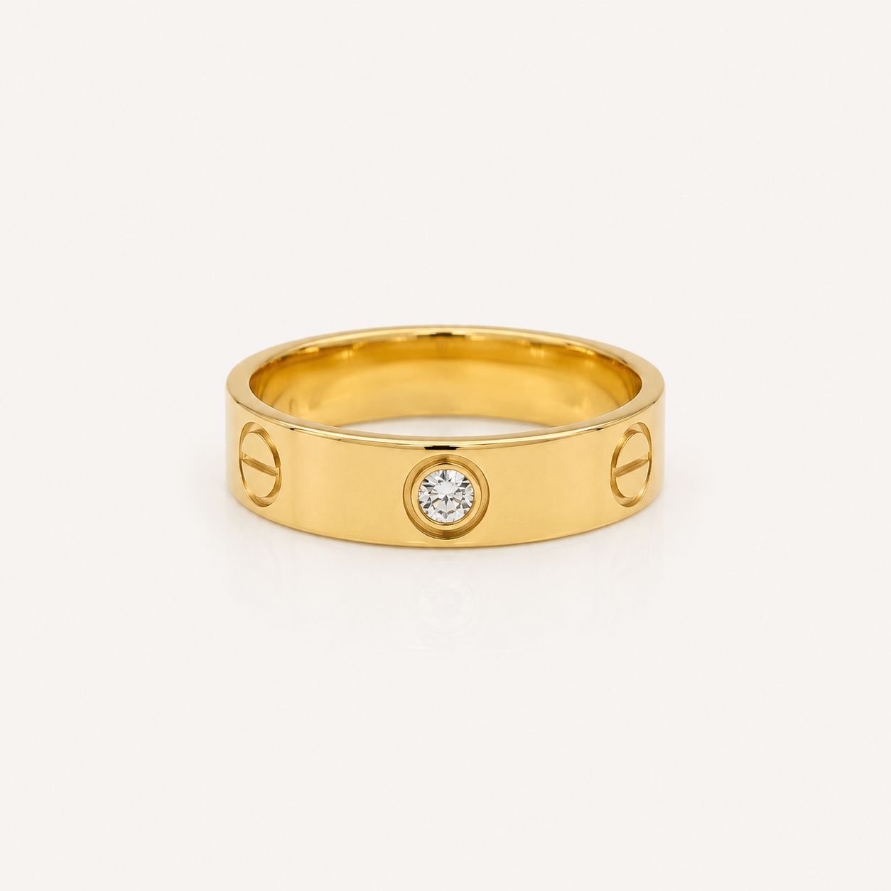 Anel Cart Ponto de luz Aço Dourado