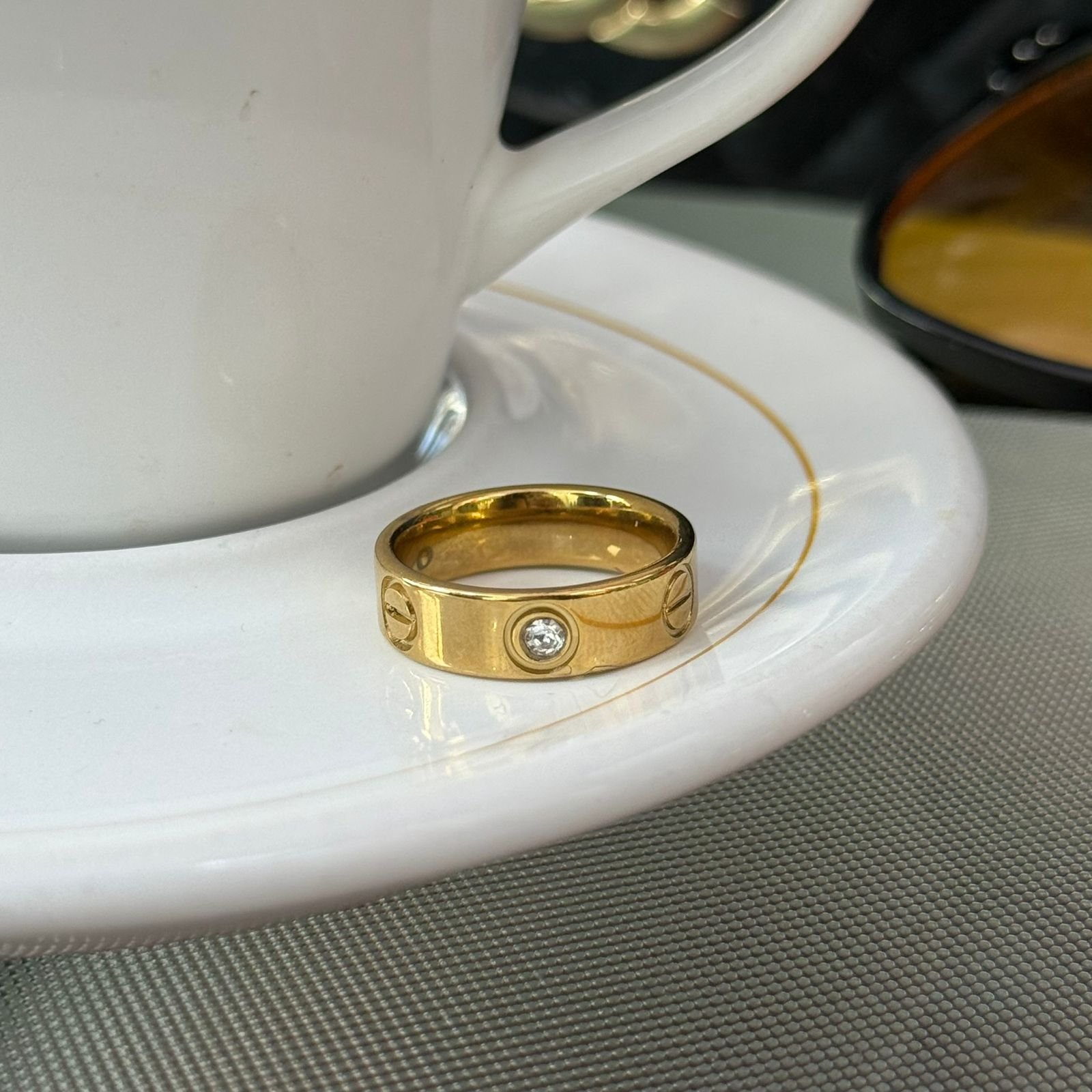 Anel Cart Ponto de Luz Aço Dourado
