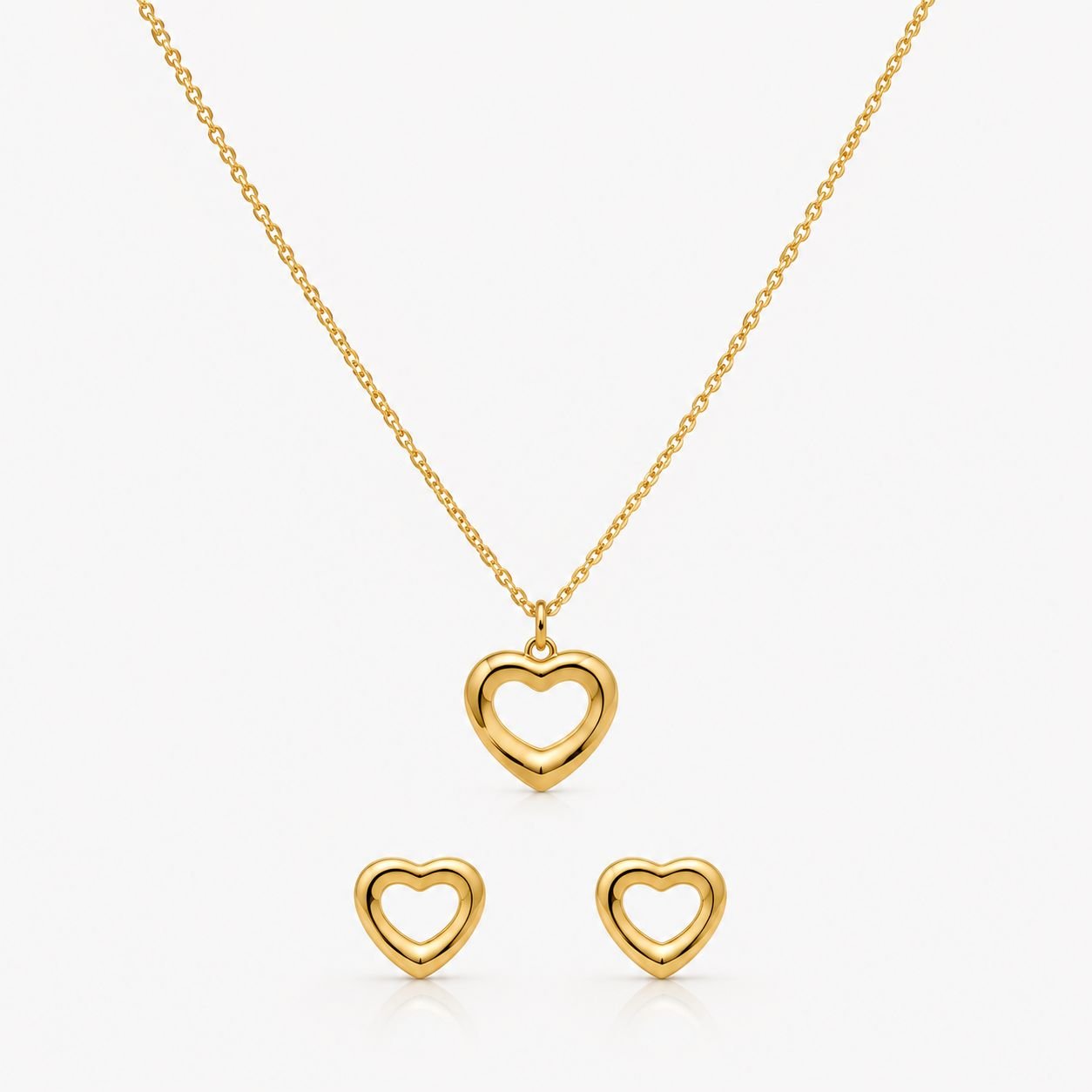 Conjunto coração Vazado Aço Dourado